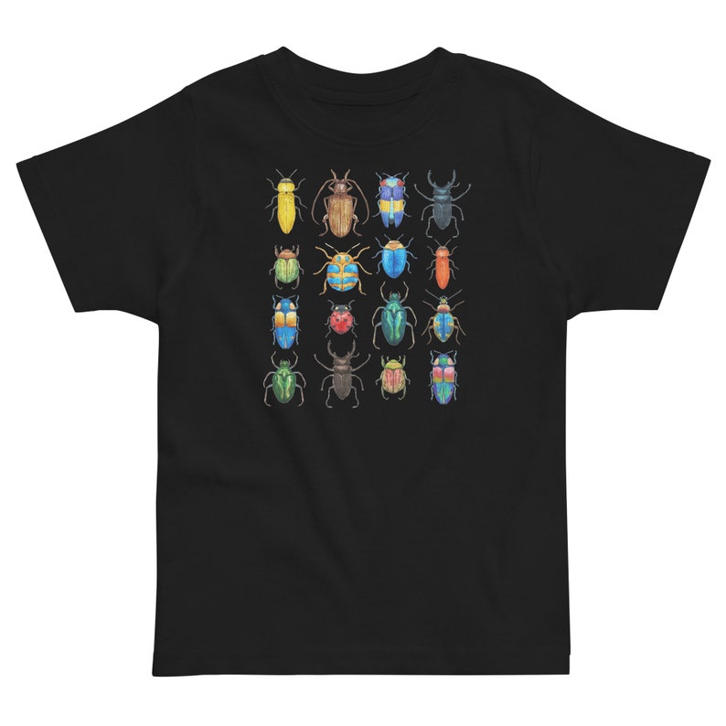 May include: Black t-shirt featuring a colourful pattern of 18 different beetles. The beetles are all different colours and have different patterns on their wings.