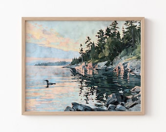 Lámina artística de un colimbo del lago Superior, paisaje de acuarela con puesta de sol en tonos melocotón, azul y verde.