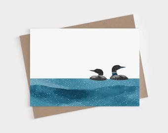 Tarjetas de felicitación minimalistas con forma de colimbo - Pájaros en acuarela sobre un lago azul - Tarjeta plegable en blanco