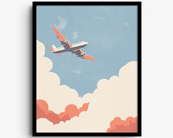 May include: A framed wall art print featuring a white and coral airplane flying through a light blue sky above large, fluffy white and coral-colored clouds. The composition is enclosed within a thin black rectangular frame border.