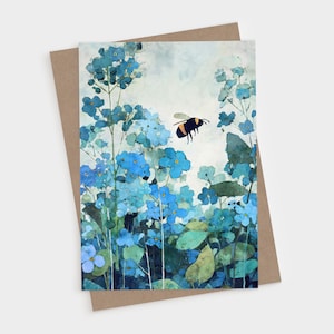 May include: A greeting card featuring a watercolor illustration of blue flowers and green leaves with a bee in flight. The card is set against a brown envelope.
