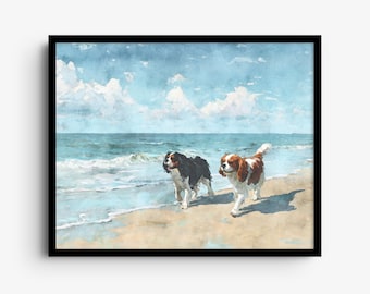 May include: A framed watercolor painting depicting two Cavalier King Charles Spaniels walking on a sandy beach. One dog is black and white, while the other is chestnut and white. The scene features a blue ocean with waves and a cloudy sky.
