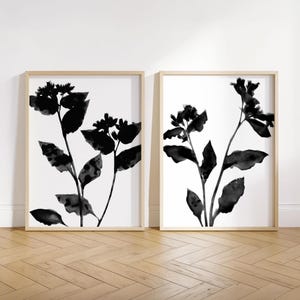 Schwarz-Weiß-Blumensilhouette-Set mit 2 minimalistischen botanischen Drucken