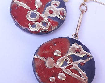 Disc earrings in raku and kintsugi ceramic