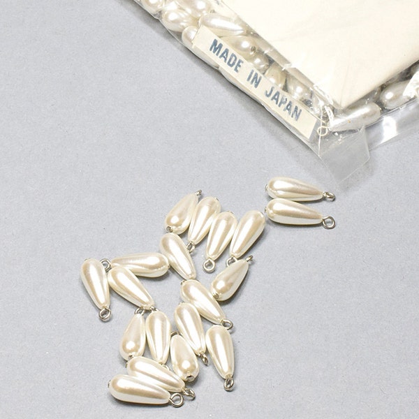 Pearls. NOS. 6x14mm. Lovely, Vintage pearls. sold by 24 pieces per pack.