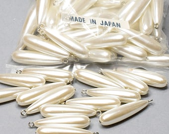 Pearls. NOS. 30x8mm. Vintage Tear Drop Pearl with Loop. sold by 12 pieces per pack.