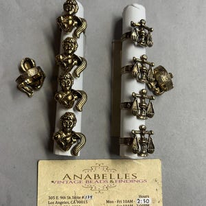 Metal findings. NOS. Constellations Rings. Sold by lots of 4 pieces.