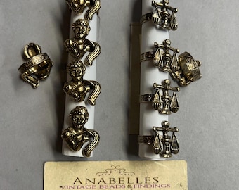 Metal findings. NOS. Constellations Rings. Sold by lots of 4 pieces.