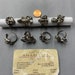 Metal findings. NOS. Vintage Zodiac rings. Constellations Rings. Sold by lots of 4 pieces. 