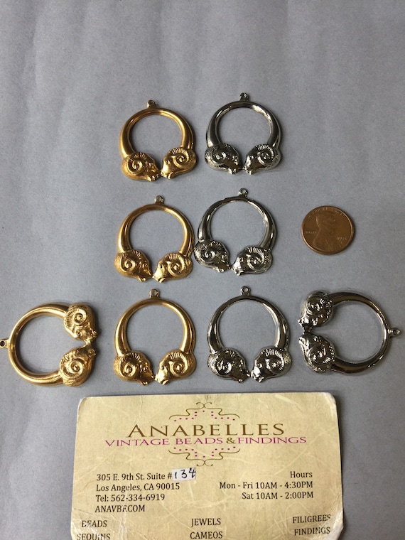 Metal findings. NOS. 34x29mm. Sold by lots of 12 pieces.