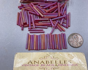 Bugle beads. NOS. 20x2mm,  glass bugle beads. Red Iris Matt  Anavbf. Sold by 1 ounce pack.