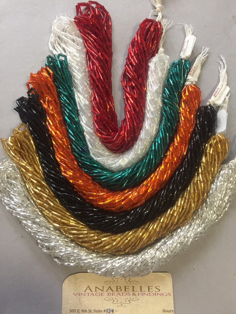 Bugle Beads 7x2mm 3 Lovely Twisted bugle bead. Sold by Etsy