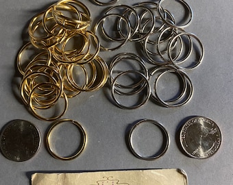 Metal findings. NOS. 23mm Jump Rings. Sold by lots of 24 pieces