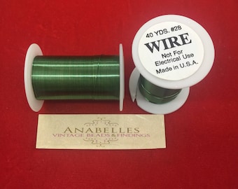 Fil. NSA. Fil vert de calibre 28. Vendu par bobine.
