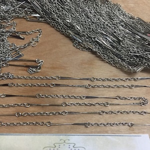Metal findings. NOS. 2mm. Lovely vintage bar chain. Sold by lots of 6 Ft.