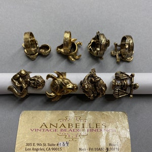 Metal findings. NOS. Constellations Rings. Sold by lots of 4 pieces.