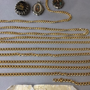 Metal findings. NOS. 3mm. gold plate, Steel chain. Sold by Lots of 3 Ft.