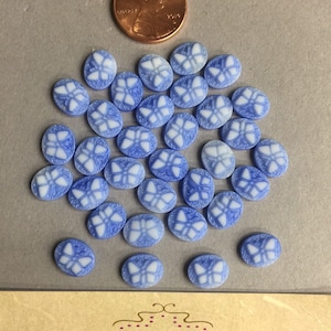 Vintage Cabochons. NOS. 10x8mm. Glass cabochons. Sold by lots of 12 pieces.