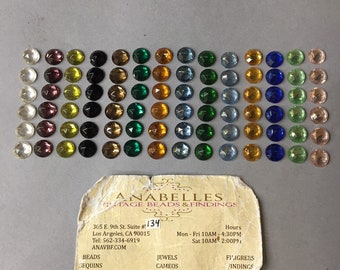 Vintage Cabochons. NOS. 9mm. glass jewels. Sold by lots of 12 pieces.