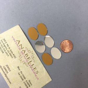 Cabochons flat back. NOS. 18x13mm, Glass Mirrors. Sold by lots of 12 pieces.