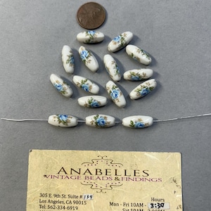 Vintage Beads. NOS. 18x7mm. Porcelain Flower Beads . Sold by lots of 12 pieces.