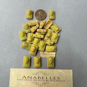 Vintage beads. NOS. 15x9x3.5mm Egyptian, Pharaoh. Sold by lots of 12 pieces.
