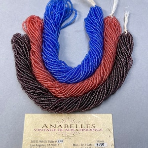 Glass seed beads. 10/0. Sold by bunch of 12 strands.