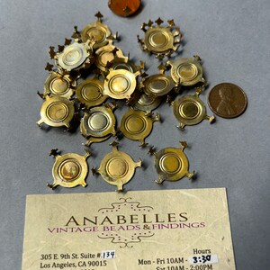 vintage settings. NOS. 16mm, metal settings. sold by lots of 24 pieces.