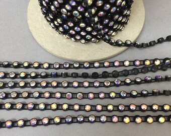 Crystal rhinestone chain. 1 Row, 19-SS. plastic base. Sold by Ft.