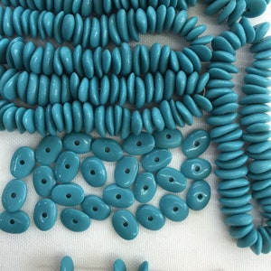 Japanese beads. NOS. 9x7x2mm Lovely vintage Glass beads. Sold by lots of 50 pieces.