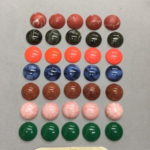 Cabochons. NOS. 18mm Lovely, Vintage cabochons. Sold by lots of 12 pieces.