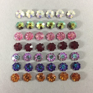 Crystals item 3700. NOS. 8mm Margarita beads. Sold by lots of 12 pieces.