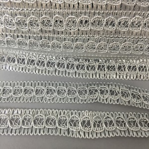 Vintage trims. Metallic braids.1 1/4” inches, silver trims. sold by yard or 4 yards.