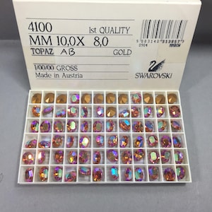 Vintage crystals. NOS. Item #4100.  10x8mm. Pointed back cabochons. Sold by lots of 12 pieces.