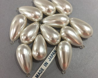 Pearls. NOS. 28x16mm lovely Vintage Off White, Tear Drop Pearl with Loop. sold by lots of 12 pieces.