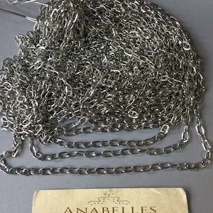 Metal findings. NOS. 4mm, Silver Tone Chain . Sold by Lots of 3 Ft.