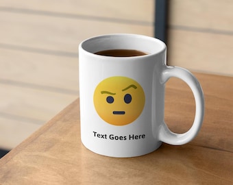 Personalised White Emoji Mug featuring Face With Raised Eyebrow emoji