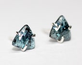 Teal moss kyanite claw set silver studs