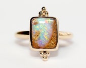 Gold Opal ring. 9ct yellow gold and Australian pipe Opal ring