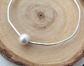 Freshwater pearl bangle. Asymmetric bangle