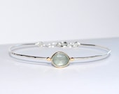 9ct gold and silver aquamarine bracelet. Minimal jewellery