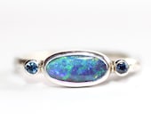 Boulder Opal and blue sapphire ring