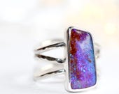 Purple boulder opal ring. Triple band wave design