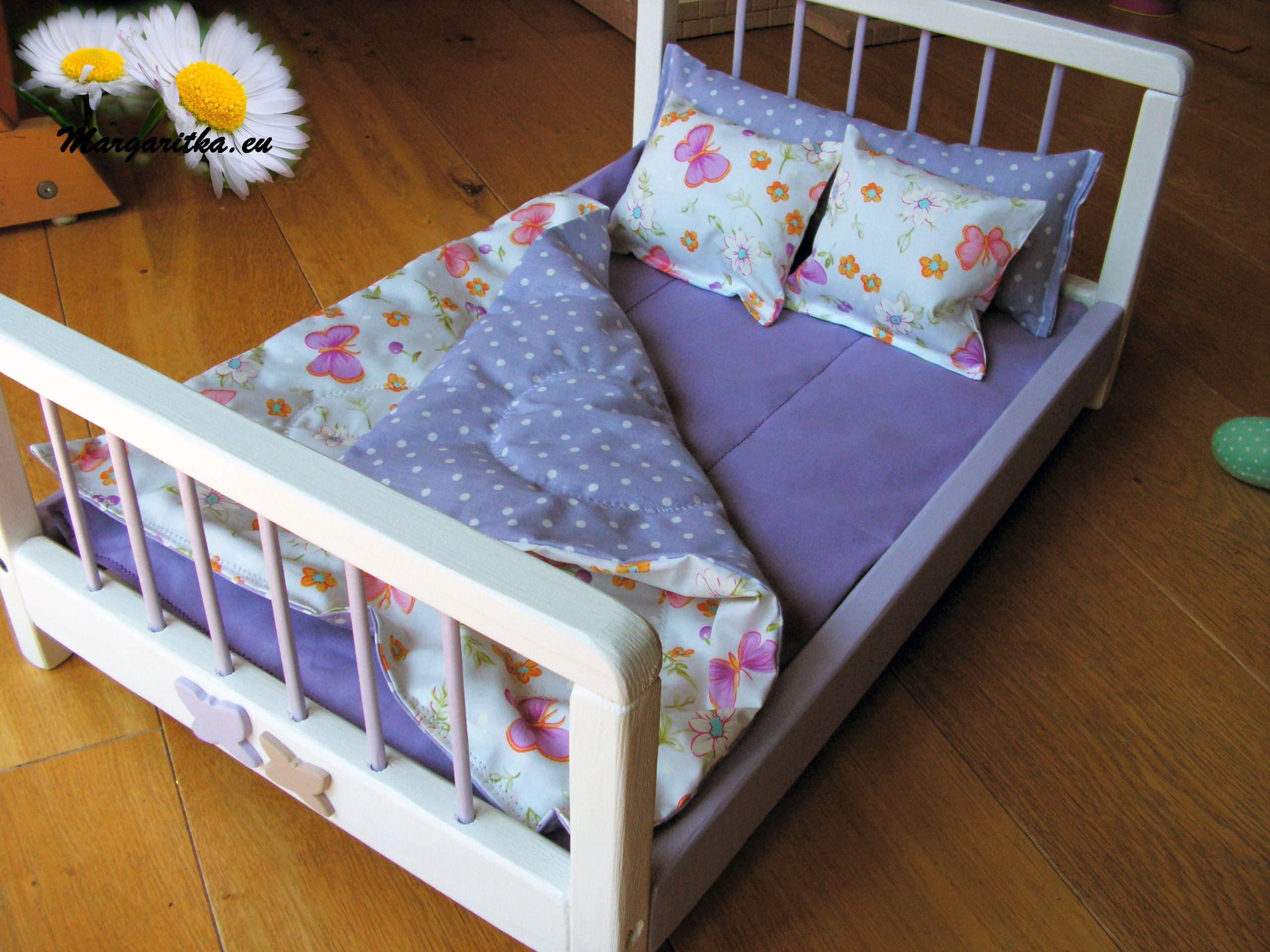 large wooden doll bed