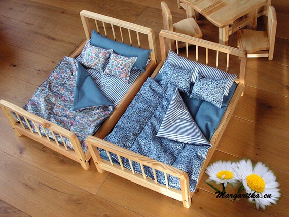 large wooden doll bed