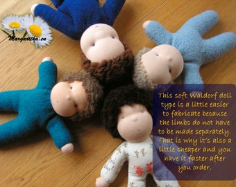 May include: Four Waldorf dolls made of soft fabric in blue, teal, and white. The dolls are lying on a wooden surface. The dolls have brown hair and are all facing the camera. The text "This soft Waldorf doll type is a little easier to fabricate because the limbs do not have to be made separately. That is why it's also a little cheaper and you have it faster after you order." is visible in the image.