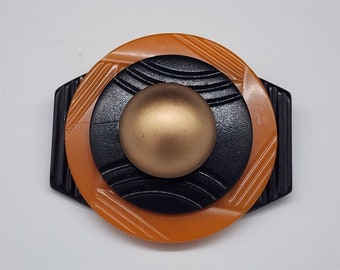 Design Art Deco plastica celluloide Brook nero arancione UV Glow VTG 2,5x2,25