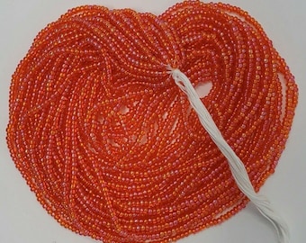 Czech Glass Seed Bead 11/0 Iridescent Salmon Orange Hank of 12 Strands VTG