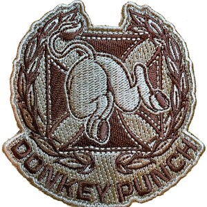 May include: A tan and brown embroidered patch with a stylized image of a pair of boxing gloves and the text "DONKEY PUNCH" around the outside.