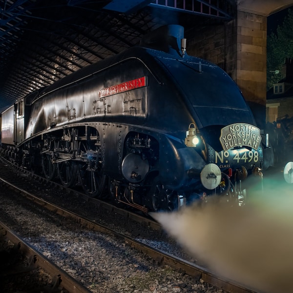 Steam engine "Sir Nigel Gresley" pauses at Pickering Station on the North Yorkshire Moors Railway